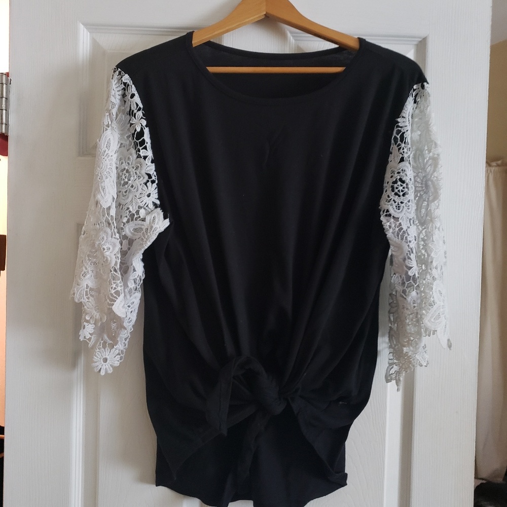 Black tie top with crocheted flower sleeves